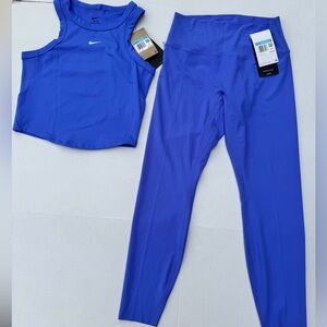 NEW WITH TAGS Periwinkle Nike cropped top and leggings.